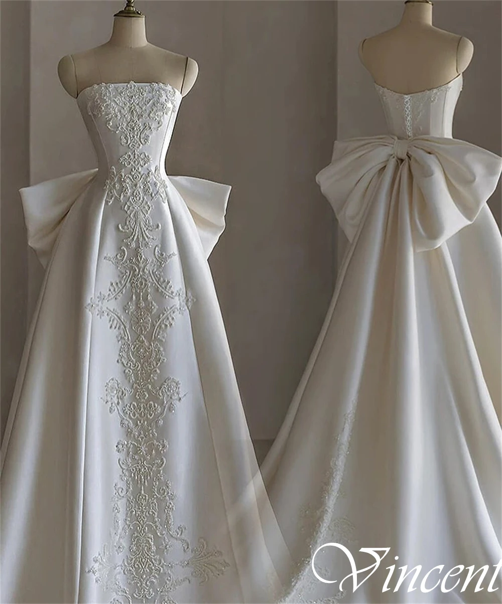 فساتين زفاف عصرية مخصصة بدون حمالات من الساتان بدون أكمام على شكل حرف a فستان زفاف كلاسيكي بفيونكة كريستال عالية الجودة رداء de mariée