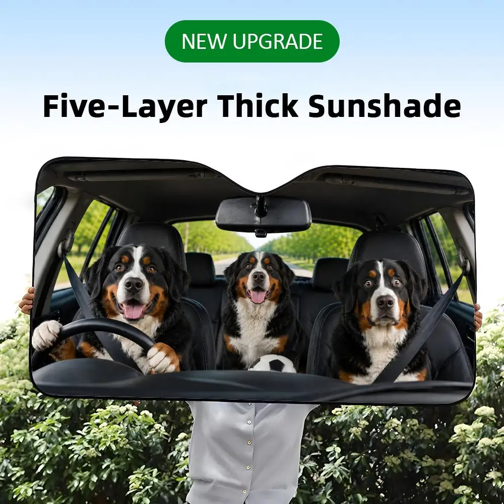 A five-layer thick car windshield sunshade with a funny graphic print of Bernese Mountain Dogs throwing a soccer party.