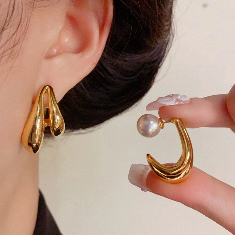 

Earrings woman 2025 trend Golden Metal Simple and concise Simulated pearl Wear on both sides ear stud
