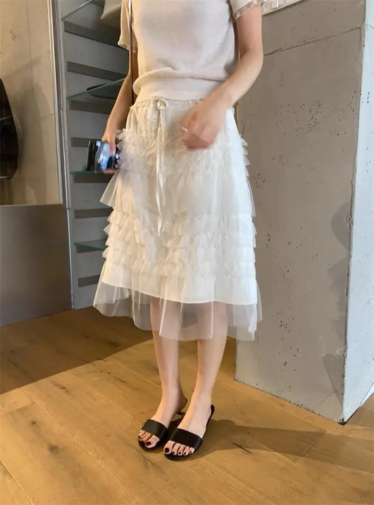 

Корейская новая многослойная юбка-миди из ткани «Wood ain» на весну 2026 года, утягивающая, с завышенной талией, А-силуэт