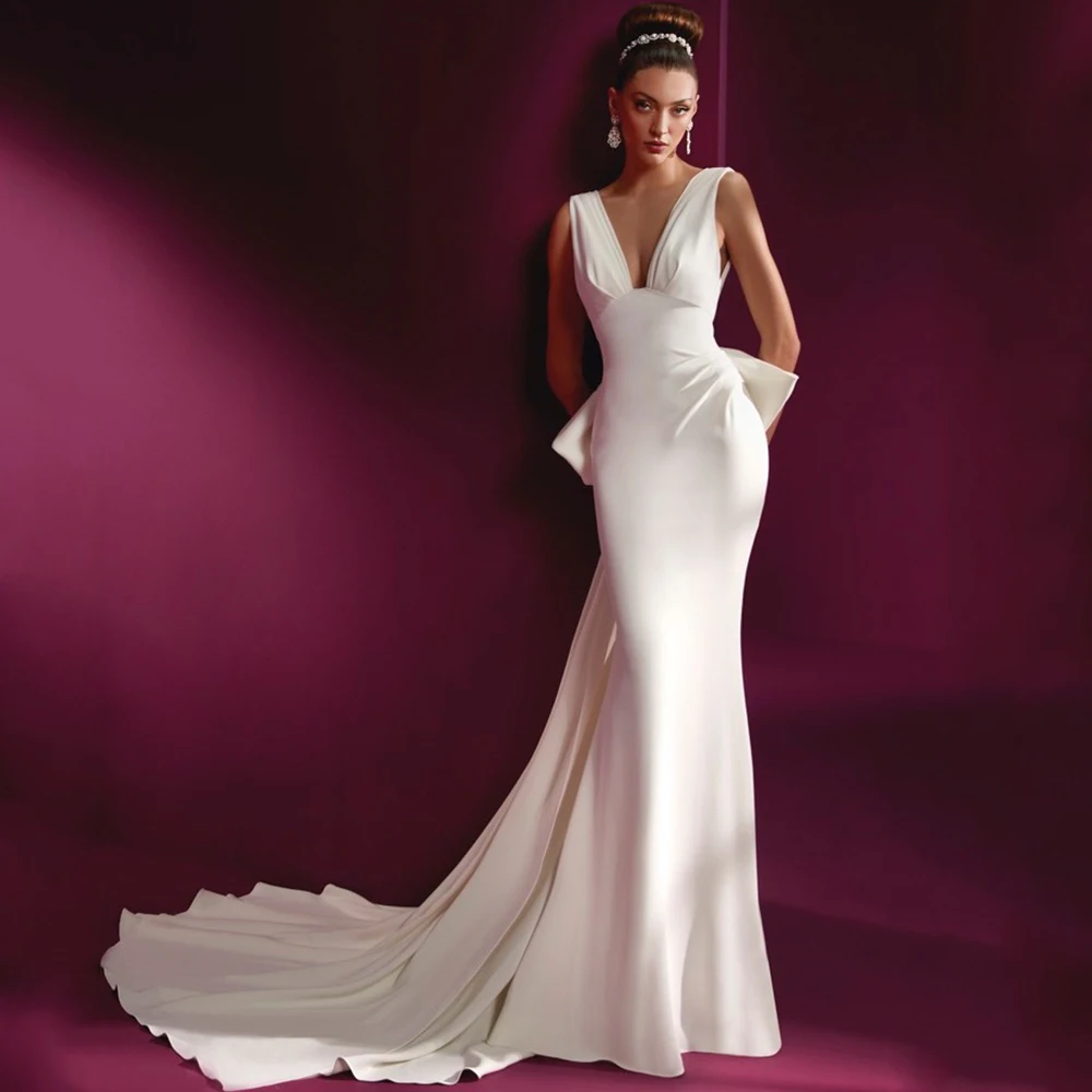 Splendido abito da sposa con fiocco senza maniche con scollo a v Sexy sirena aperta sul retro lunghezza del pavimento da sposa con strascico per abito da Marring formale