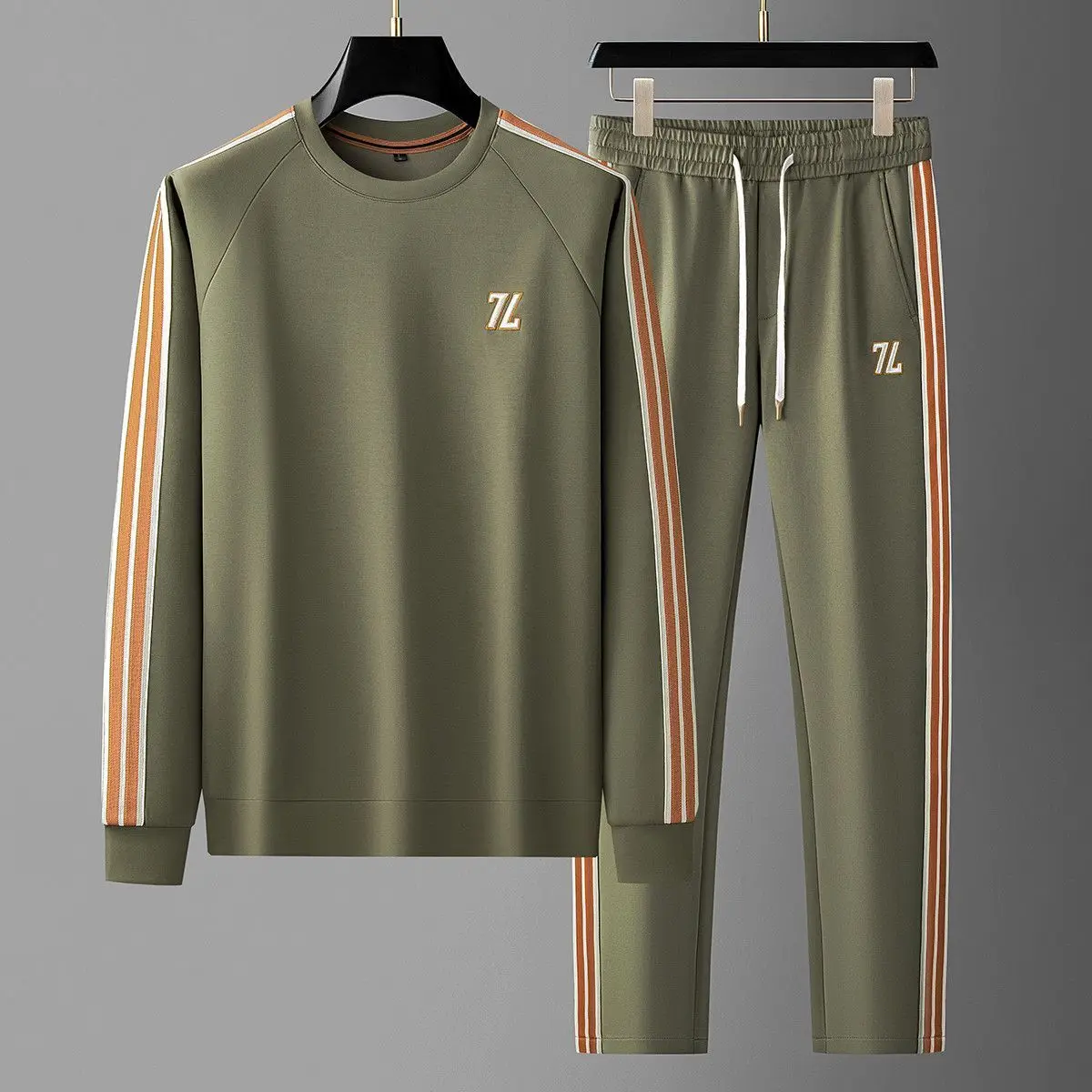 Spring and autumn light luxury men's new striped contrasting colors trend slim versatile crew neck casual sports suit