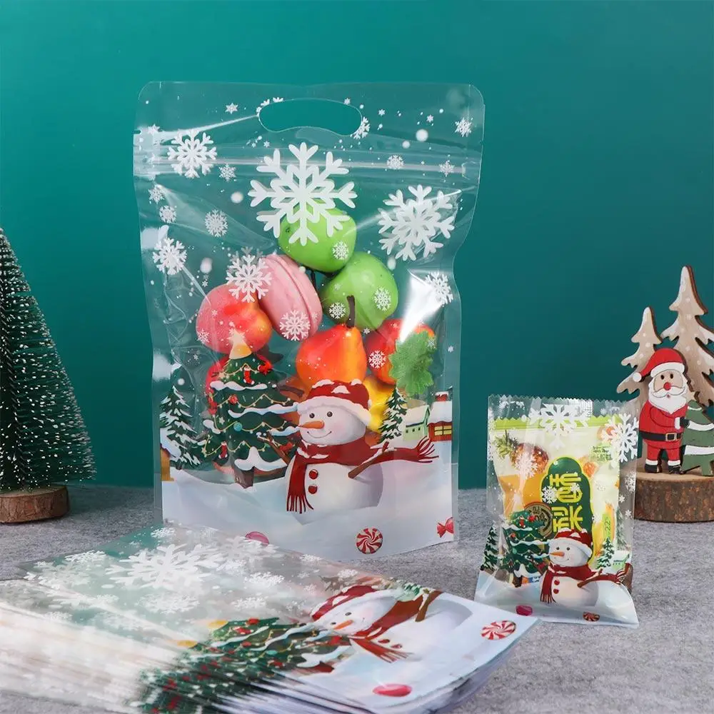 50 pçs sacos de biscoitos de plástico transparente de natal engrossado boneco de neve floco de neve padrão cozimento sacos de embalagem de doces presentes de natal