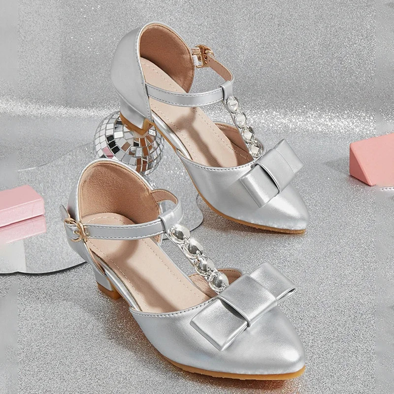 

2025 New Girls' Princess Shoes Fashion Rhinestone Bow High Heels Thick Heels Pointed Toe Children's Leather Shoes Silver