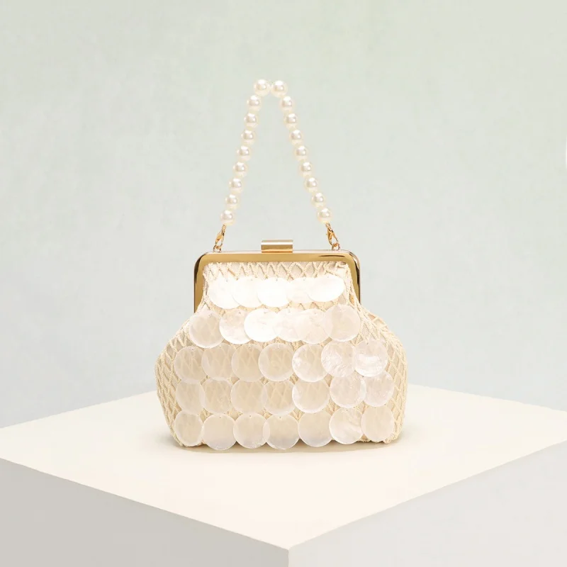 Luxury Designer Women's Handbag 2026 Shell Fishing Net Pattern Mica Slice Tassel Clip Pearl Handle Elegant Clip Bag