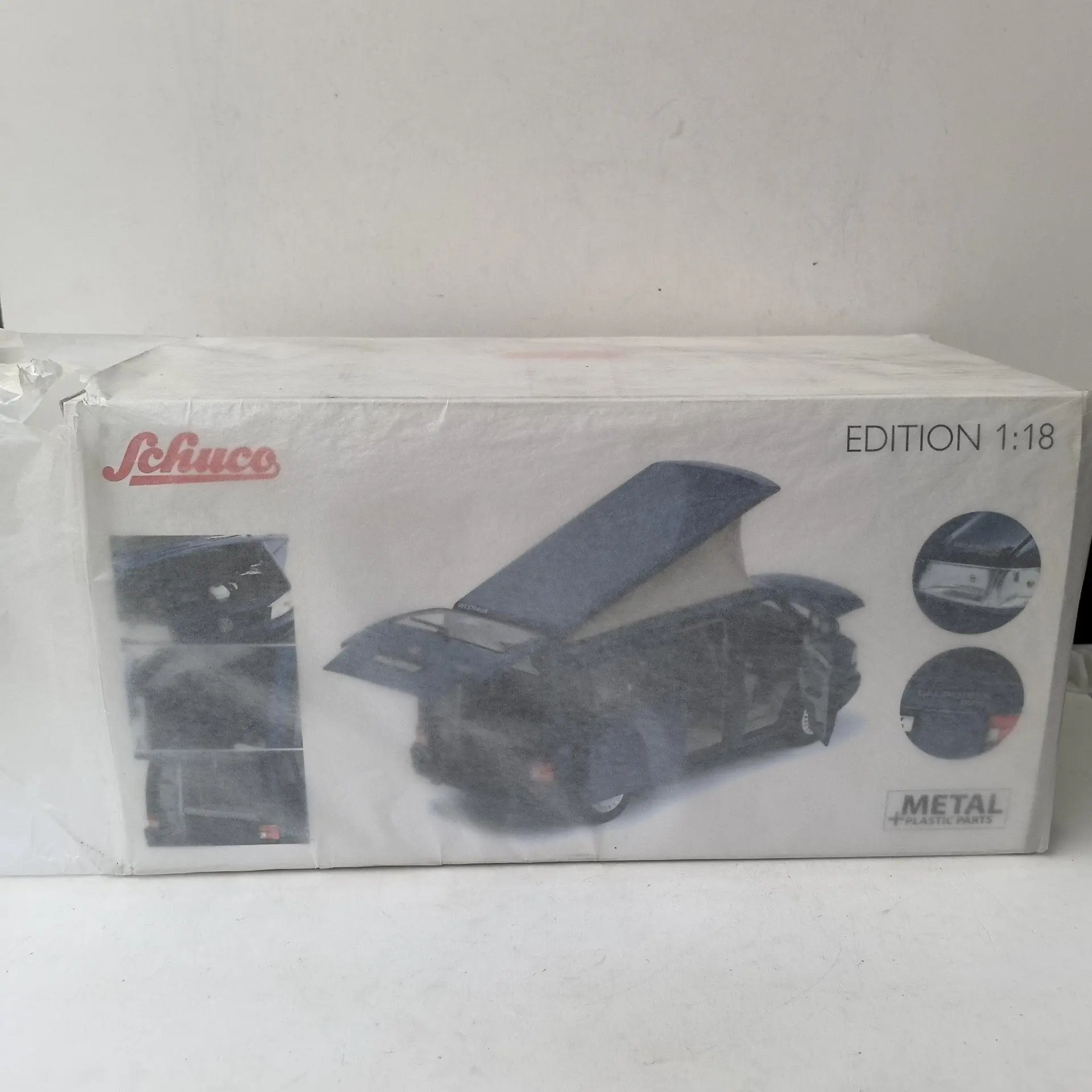 

Модель автомобиля Schuco 1:18 VW T4b Caravelle Travel Bread Bus D7 из литого металла