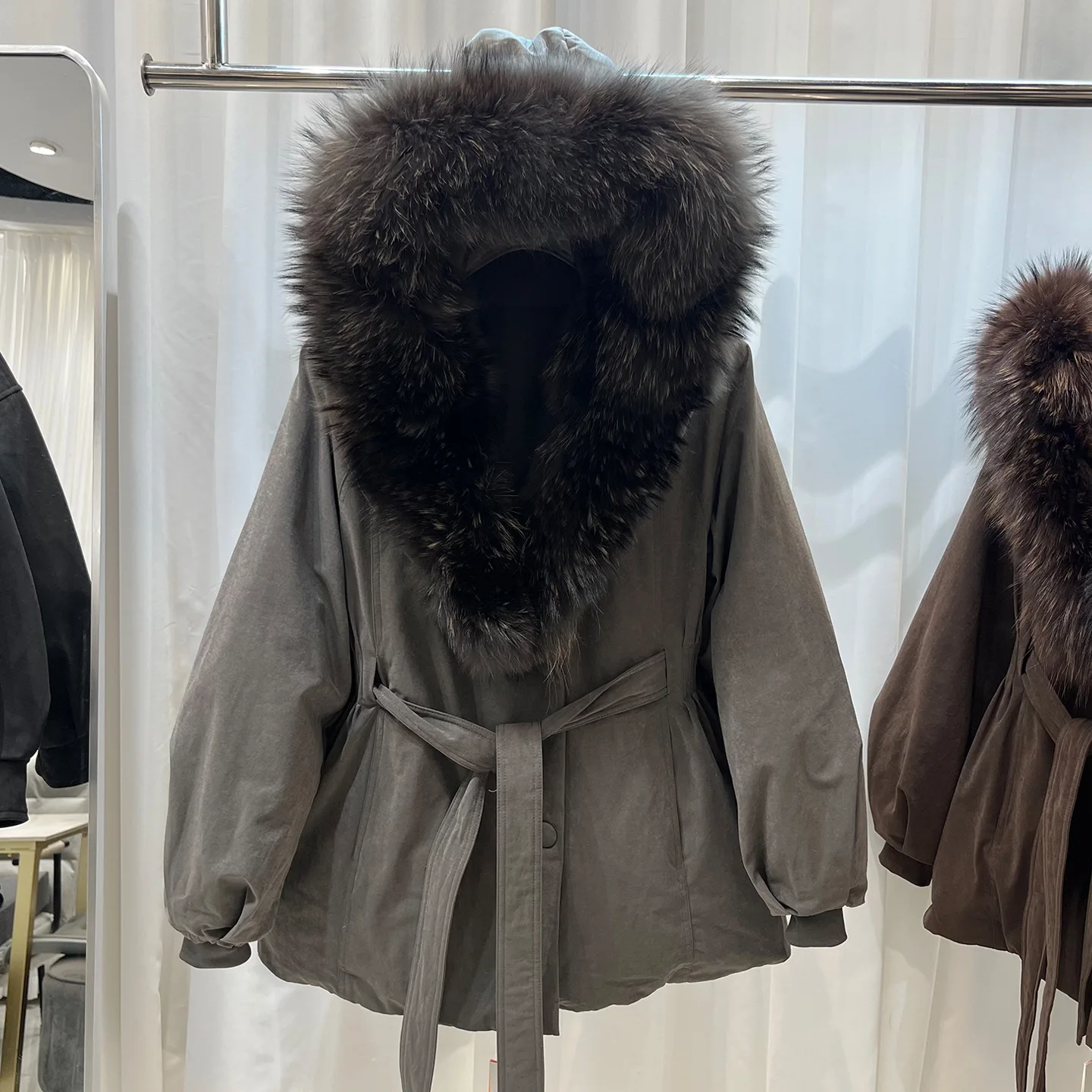 2026 winter new style big hair collar hooded down jacket female, temperament fashion tie up waist thick warm parker jacket