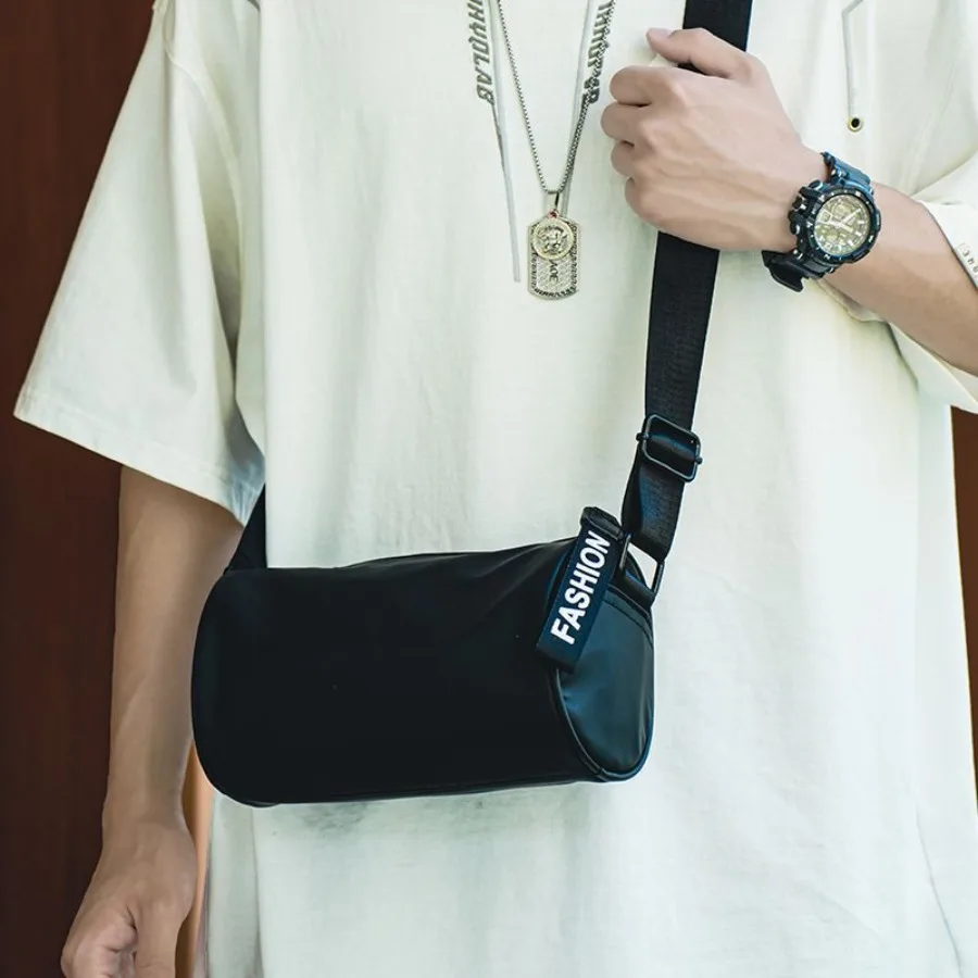 

【Spot goods】-body bag men's fashion brand men's small backpack Japanese boys niche design commuting cylinder bag single shoulde