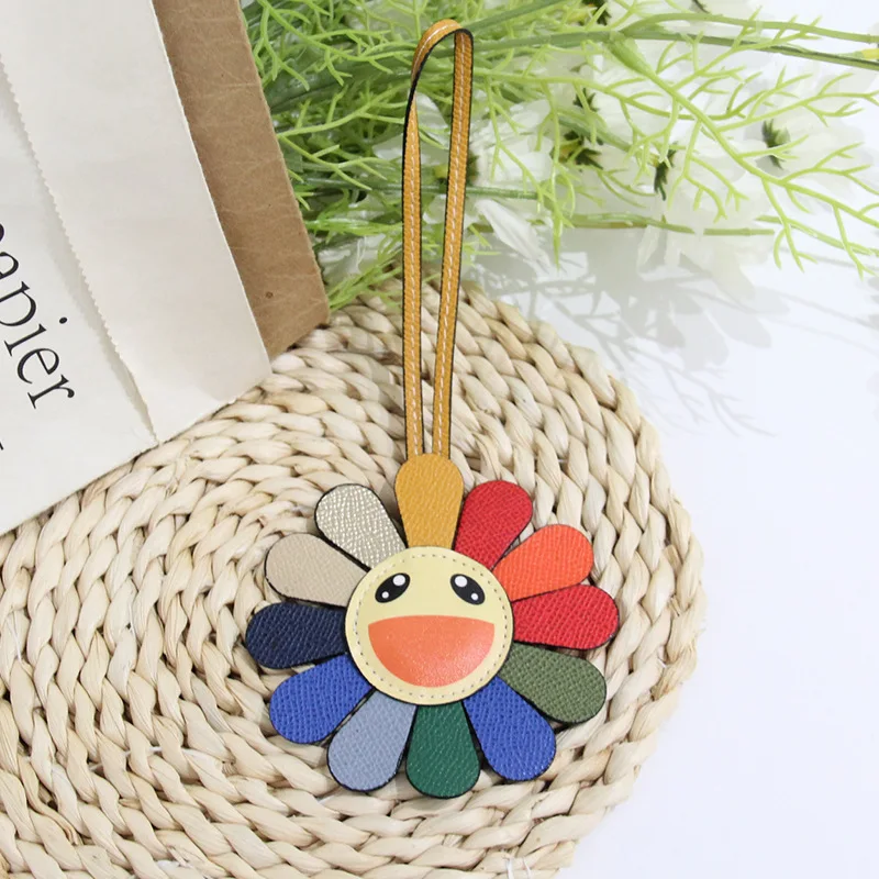 Colgante de girasol con cara sonriente de arcoíris de dibujos animados, llavero de cuero de pu con bonito flor colorida, colgante para bolso y coche