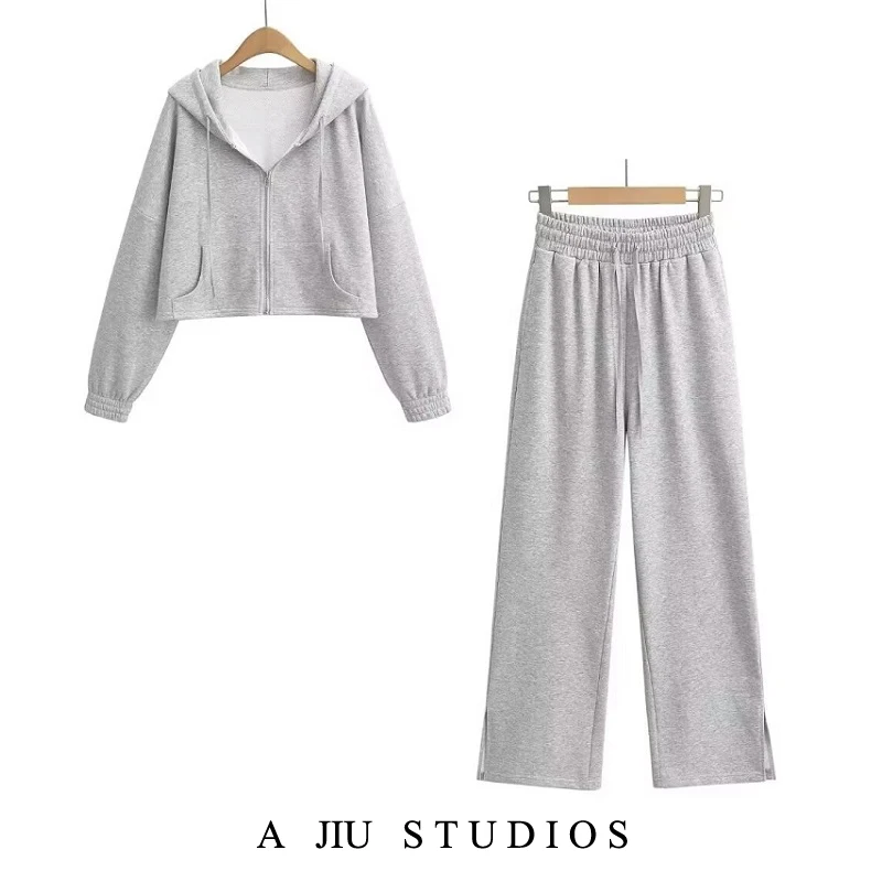 

Комплект женский: укороченное худи на молнии в американском стиле, свободные спортивные брюки с разрезами, повседневный спортивный костюм с длинным рукавом