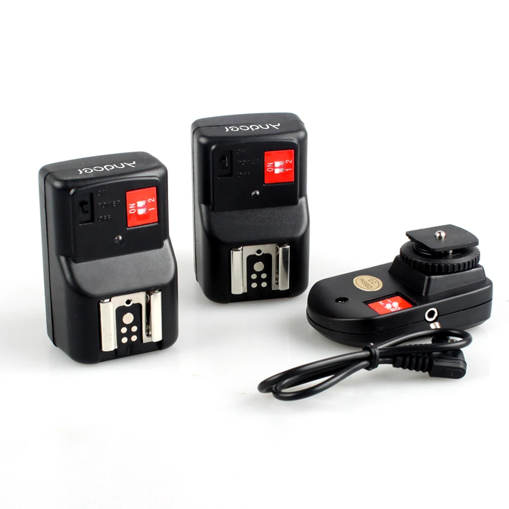 Andoer PT-04GY 4 قنوات لاسلكية عن بعد Speedlite فلاش الزناد العالمي 1 الارسال و 2 استقبال لكانون نيكون بنتاكس
