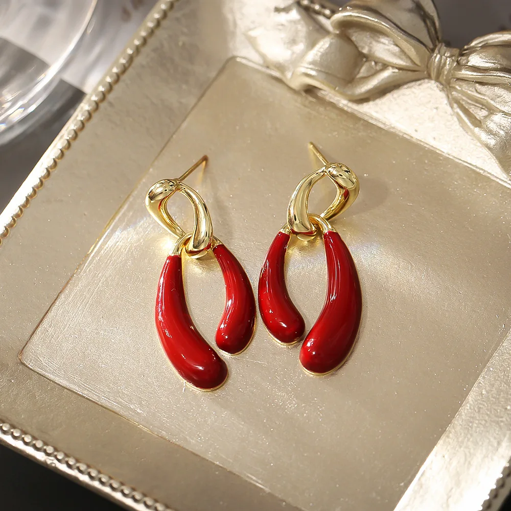 

Irregular niche ankara red earrings, light luxury and personalized dripping glaze earrings, fashionable and exquisite earrings