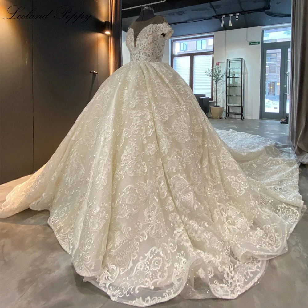 Lceland Poppy Customized Scoop Neck Ball Gown Lace Wedding Dresses Cap Sleeves Glitter Tulle Floor Length Bridal Gowns