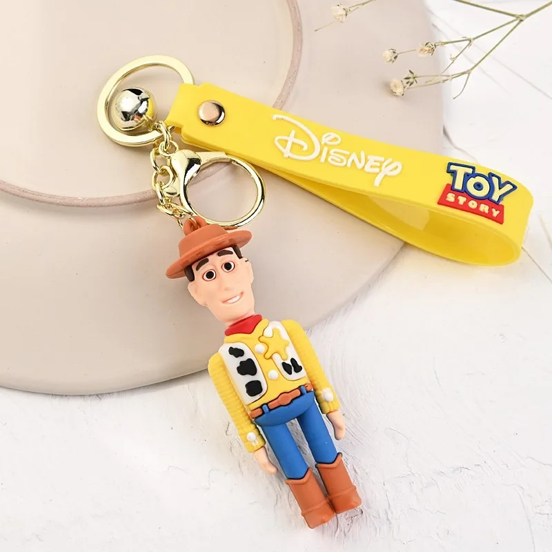 Kawaii عروسة كارتون الطنانة الخفيفة الفراولة الدب المفاتيح ثلاثة عيون مضحك دمية حقيبة