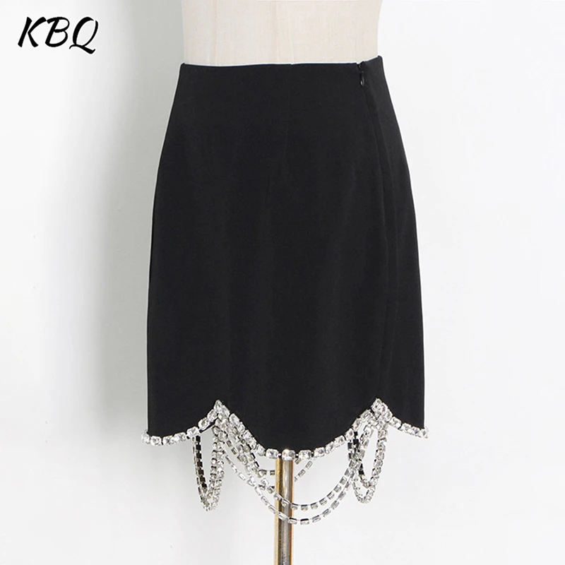 KBQ Temperament Casual Solid Spliced Chain Tassels Hem Skirt For Women High Waist Solid Minimalist Mini Skirts Female Fashion