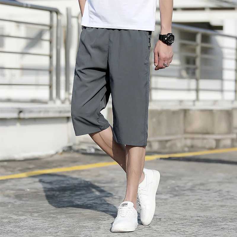 【 M-8XL 】 Solid color plus size men's pants 2024 summer fashion fast drying ice silk cropped pants straight leg shorts running s