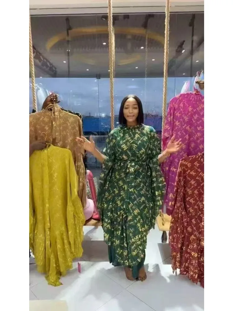 

2025 Printed New Bronzing Set Letter Lace-up Loose Miyake Pleated Bat Sleeve Top + Nine-point Pants Type Two-piece Set for Women