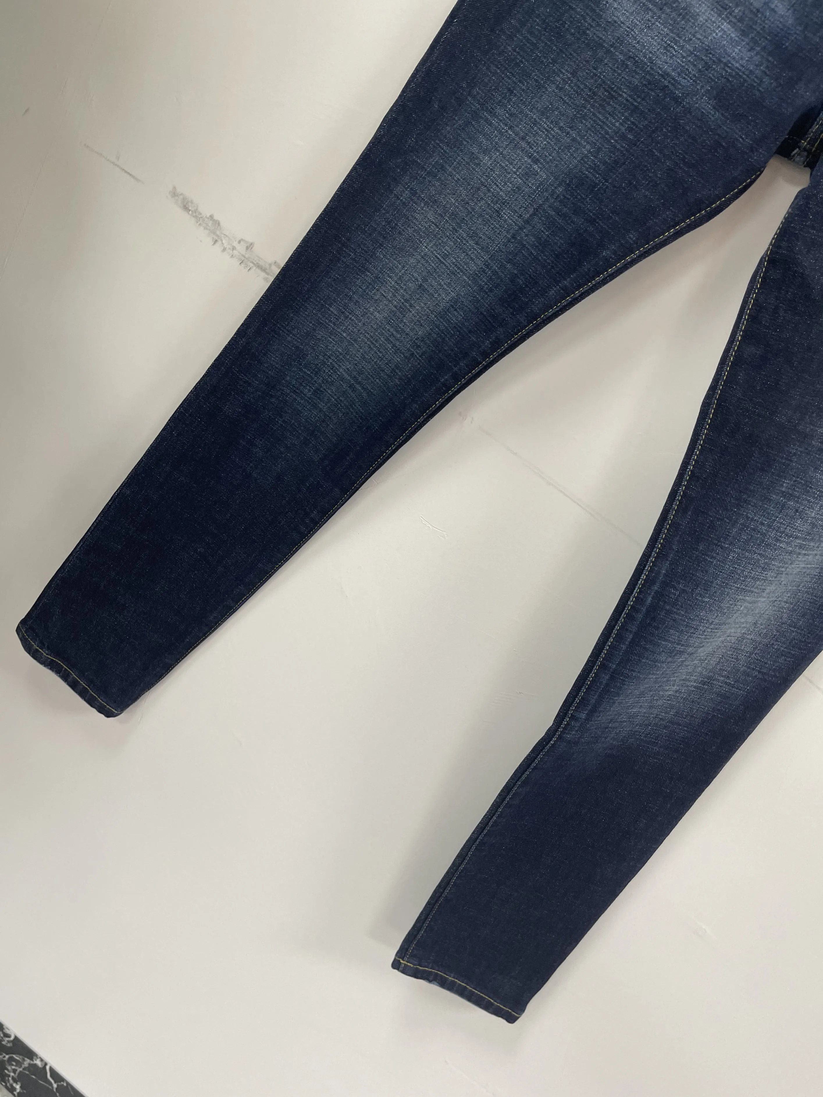 2024 New D2 Jeans Fashionable, Slim Fit, Minimalist, Worn Out Hole Patches, Painted Micro Elastic Feet Pants for Men