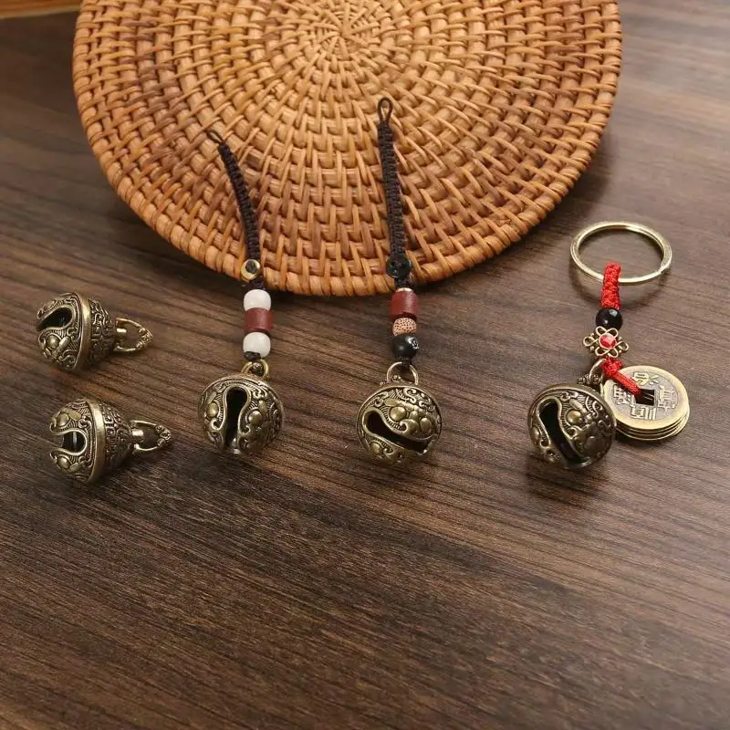 Handgefertigter Drachenkopf-Glöckchen-Schlüsselanhänger aus reinem Kupfer, hochwertiger Schlüsselanhänger aus glattem Messing als Familiengeschenk, Rucksackanhänger, Alltagsaccessoire. – Detail 2
