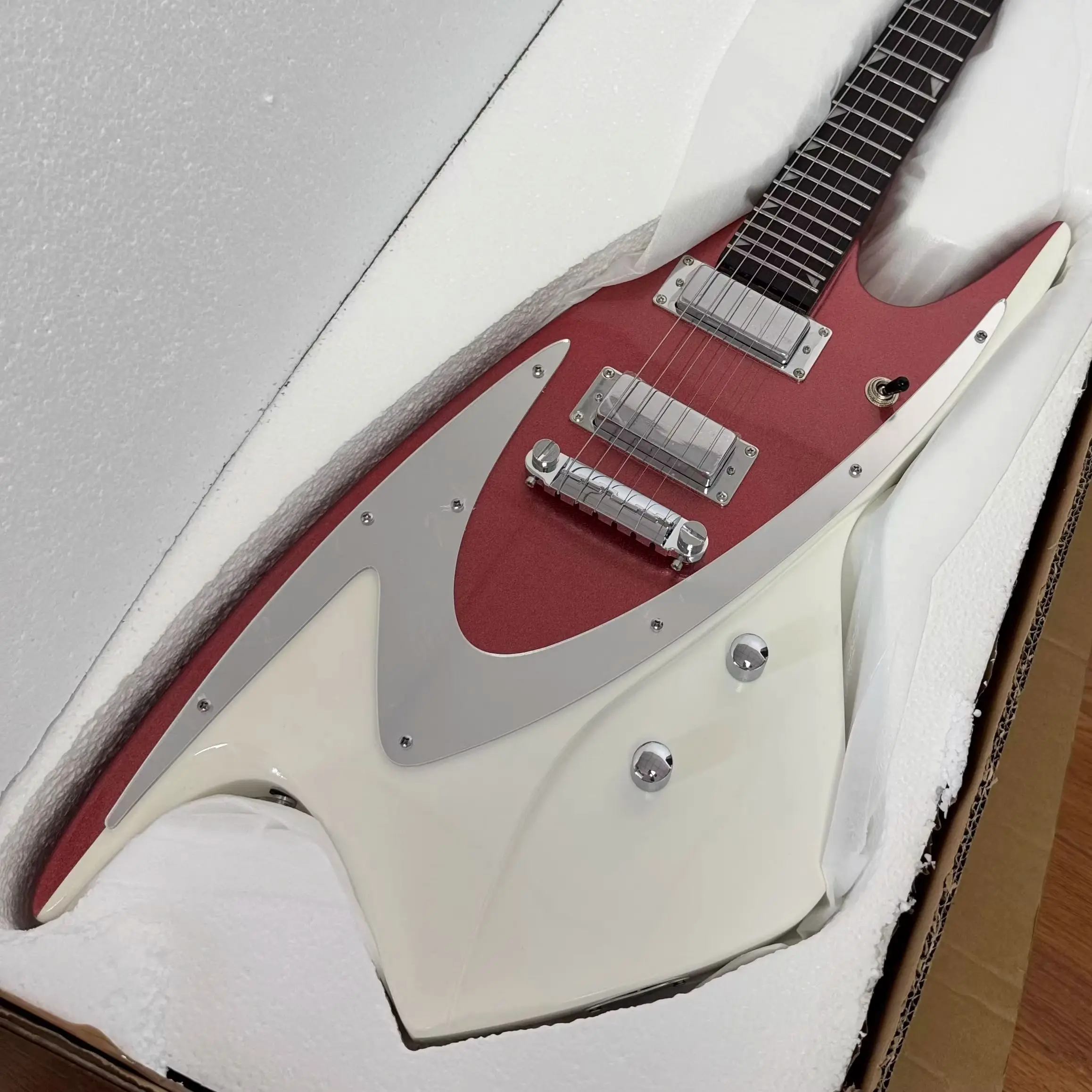Electric Guitar Features A Color Scheme Of Metallic Red And Ivory White It Is Equipped With Silver Metal Guards Christmas Gifts