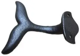 Wall hooks, decorative hooks in the shape of cast iron whale tails, used to hang coats, clothes, hats or to display costumes in