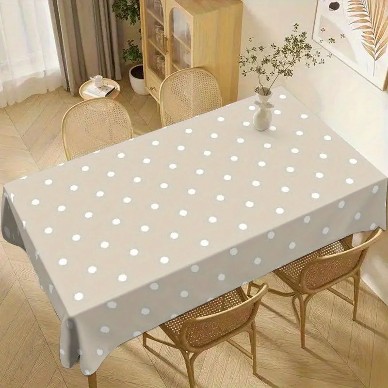 One stylish and elegant white polka dot tablecloth is the ideal choice for outdoor dining and camping!