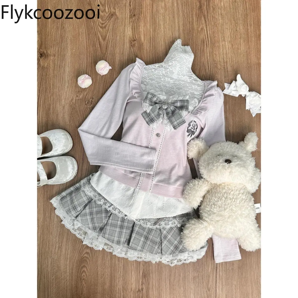 Diseño de moda Traje pequeño Top morado Falda a cuadros gris