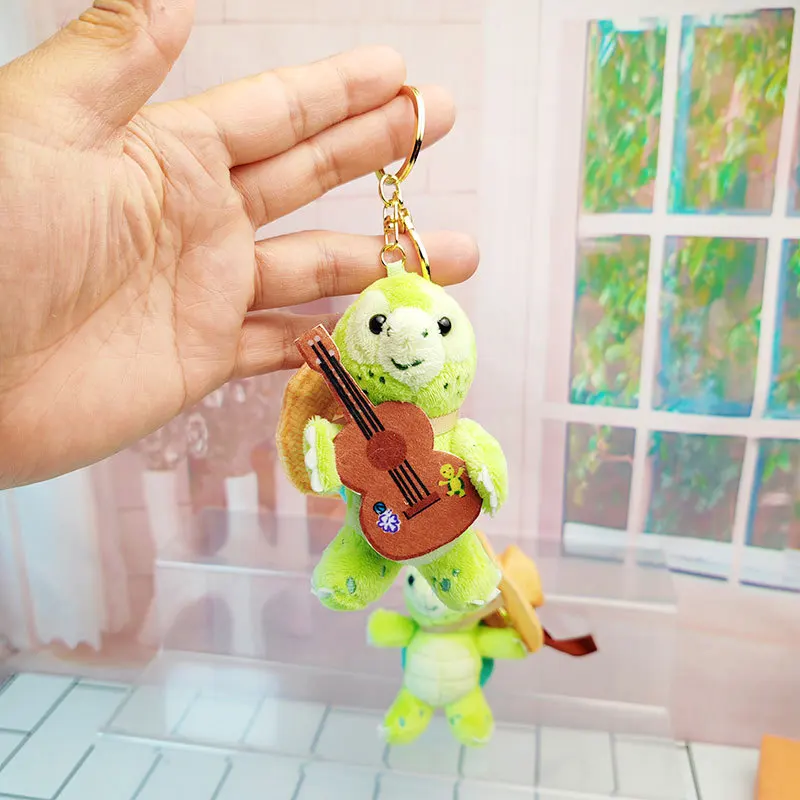 Disney Olu Mel Cotton Kreatywna Pluszowa Lalka z Kreskówki Mała Gitara Brelok Ozdoba do Plecaka Prezent dla Dziewczynki na Boże Narodzenie Urodziny