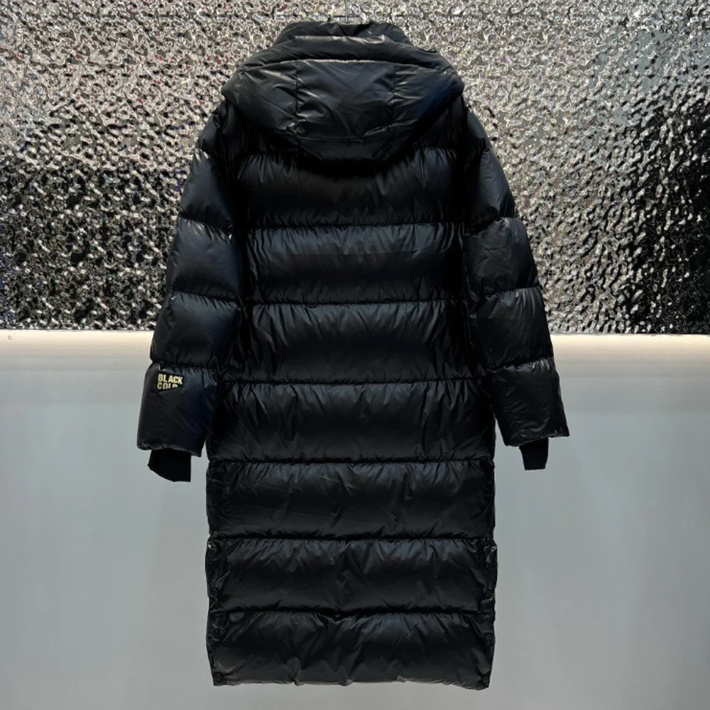 Manteau en duvet d'oie blanc chaud nouveau 2025 noir or huit grilles femmes veste longue épaissi stockage de chaleur à la mode doudoune