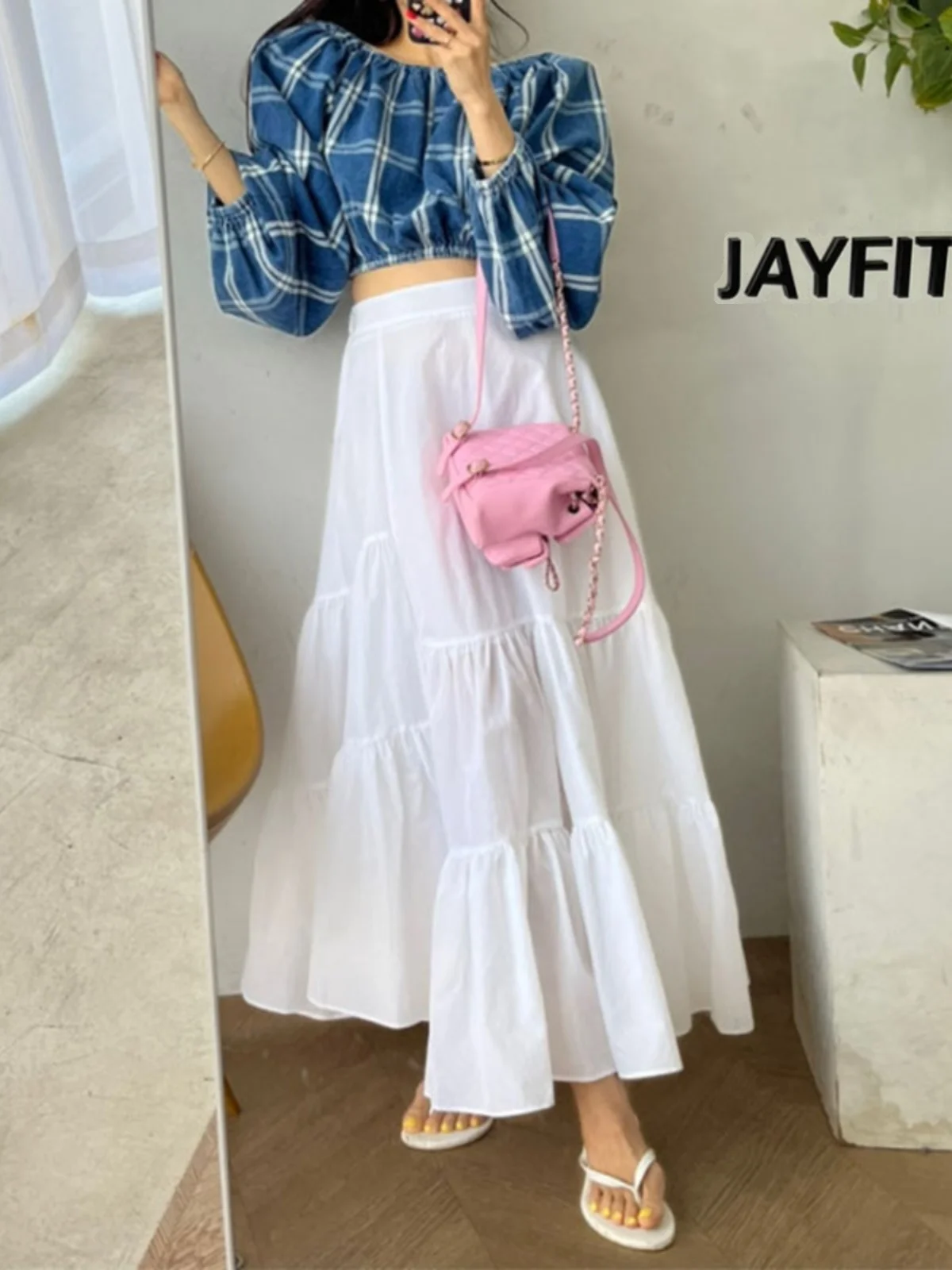 

Элегантная белая летняя юбка-трапеция с завышенной талией, универсальная женская длинная юбка, создающая нежную атмосферу, легко сочетается со всеми топами