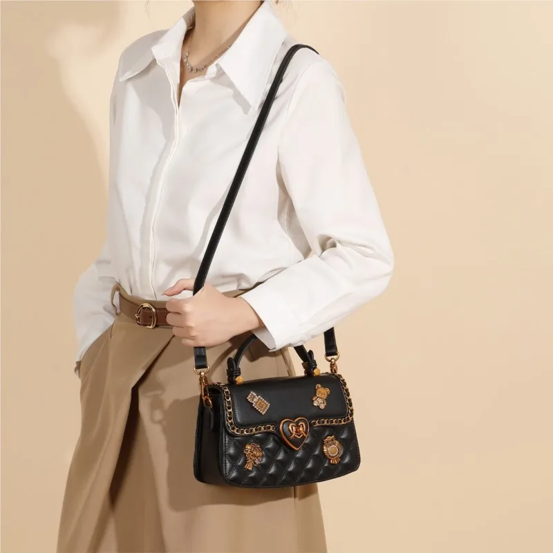 

2026 Seasonal New Women's Handbag Badge Decoration High end Multi functional Niche Design Grid Single Shoulder Crossbody Bag
