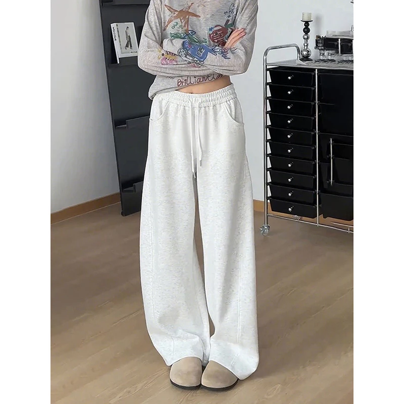 

Осенние спортивные штаны в американском стиле для мужчин и женщин. Прямые брюки по высоте и брюки длиной до ног. Свободные и широкие спортивные брюки.