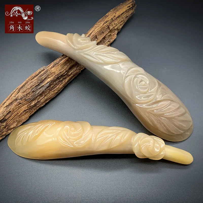 

Hand-carved rose-shaped massage beauty tool made from hornwood and yak horn