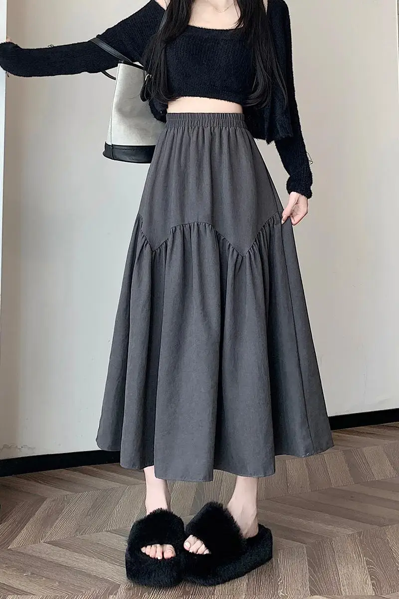 Half length skirt for women in autumn, with a high waist and a drooping feeling. A-line skirt, mid length and large swing skirt