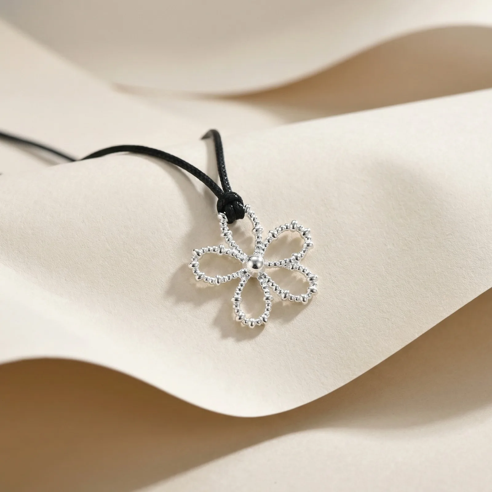 

Wholesale Rhodium Plated Hollow Flower Pendant Necklace, Adjustable Slider Black Cord Jewelry for Women Gift