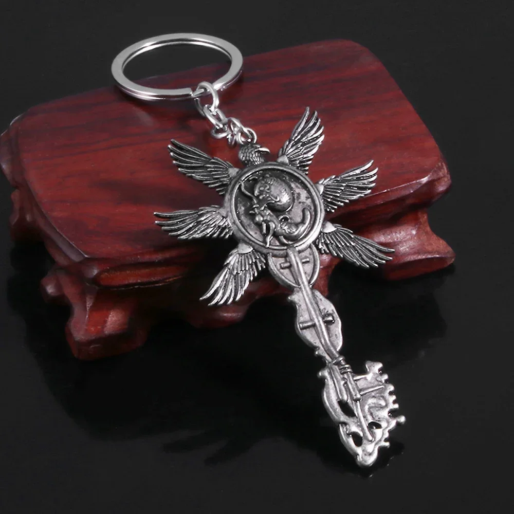 Game Residents Evils 8 Village Keychain Vintage Six-Winged Unborn Key Pendant Keyring For Men Women Bag Car Key Holder Jewelry
