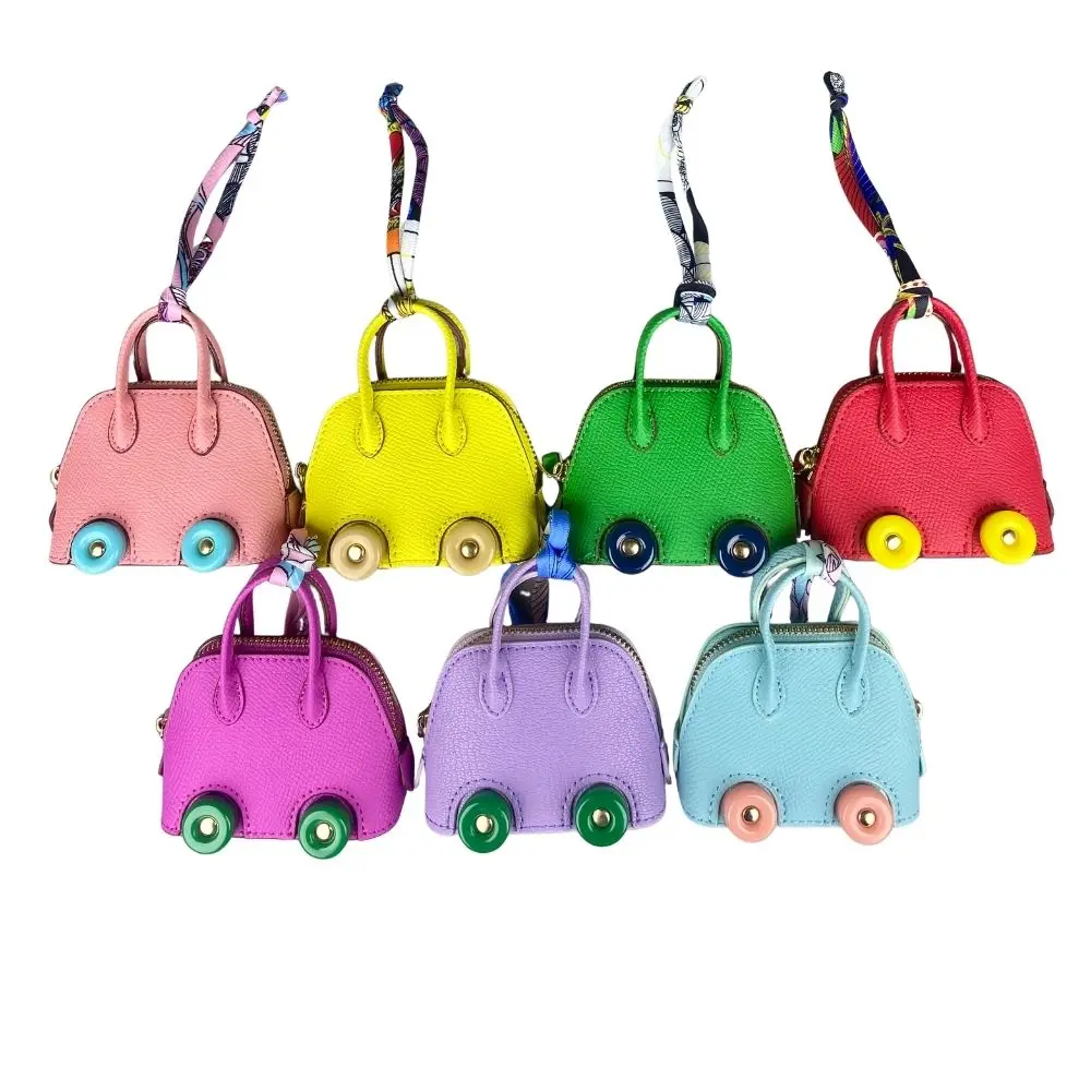 Mini-Taschenanhänger aus Leder mit niedlichen Rädern – Kopfhörer- und Lippenstiftbeutel mit zwei Riemen – PU-Leder – ideal für Taschenzubehör – Detail 4