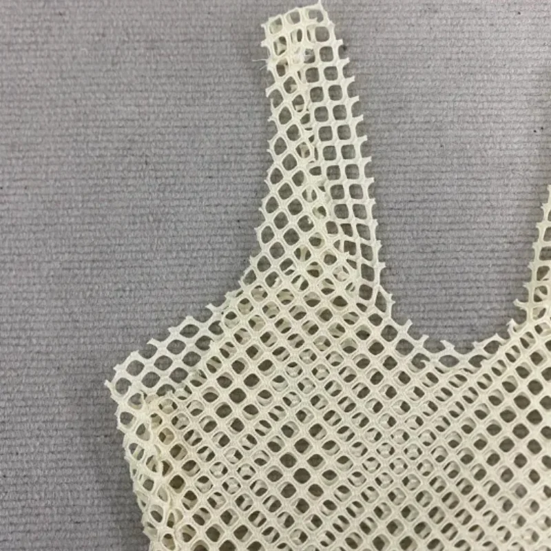 2026 europeu americano doce picante estilo feminino vestido de malha sheer magro oco para fora na moda festa casual outfit