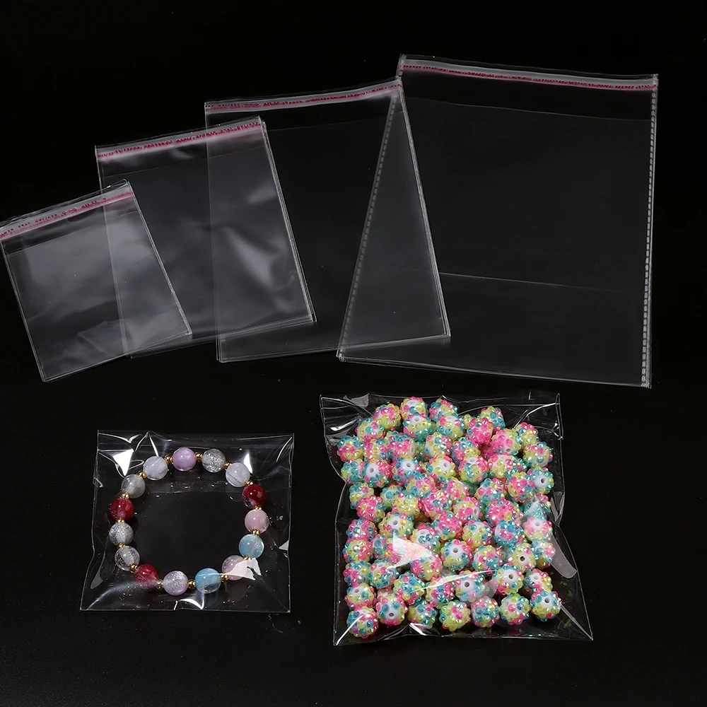 100 pièces de sacs transparents auto-adhésifs pour bijoux, bonbons, emballages OPP, sacs refermables pour cadeaux, emballages pour biscuits