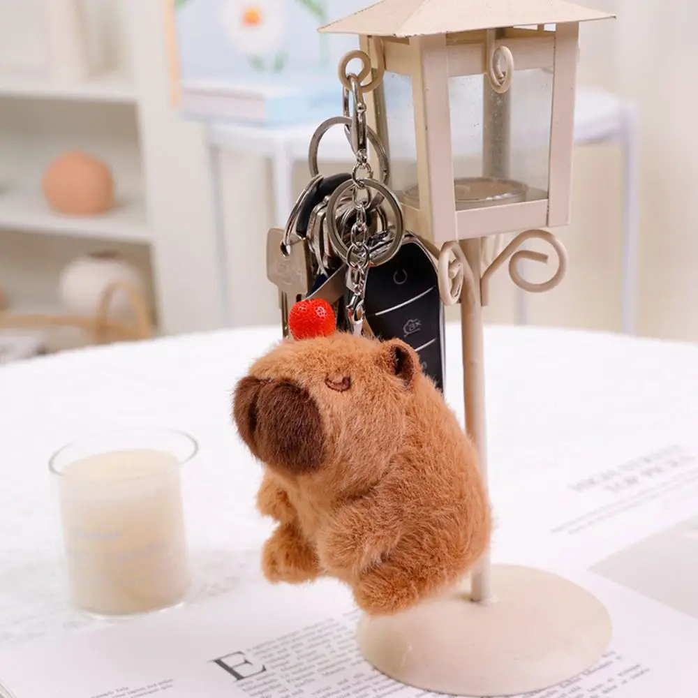 Kawaii Luminous Plush Capybara Keychain PP Cotton Wagging Tail Cartoon Couple Pendant Music Doll Capybara Keyring Bag Ornaments