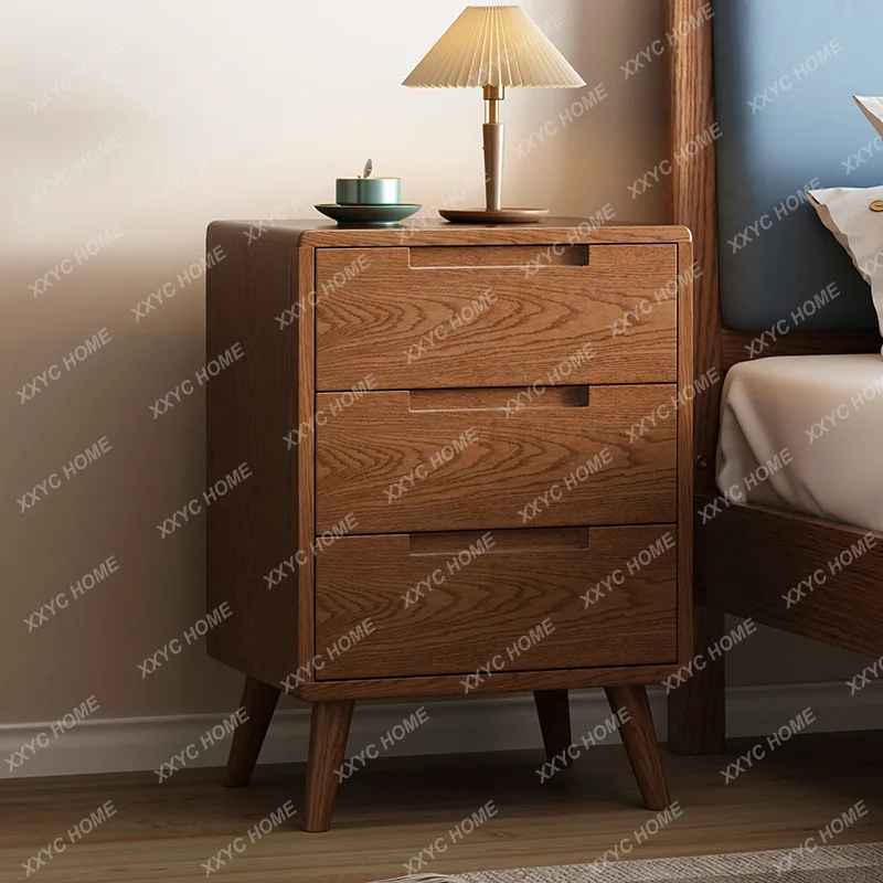 

Q All solid wood three pumping bedside table oak storage bedroom locker
