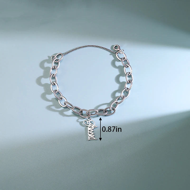 

Genuine 925 sterling silver James Avery Textured Oval Charm Bracelet paired with a happy pendant