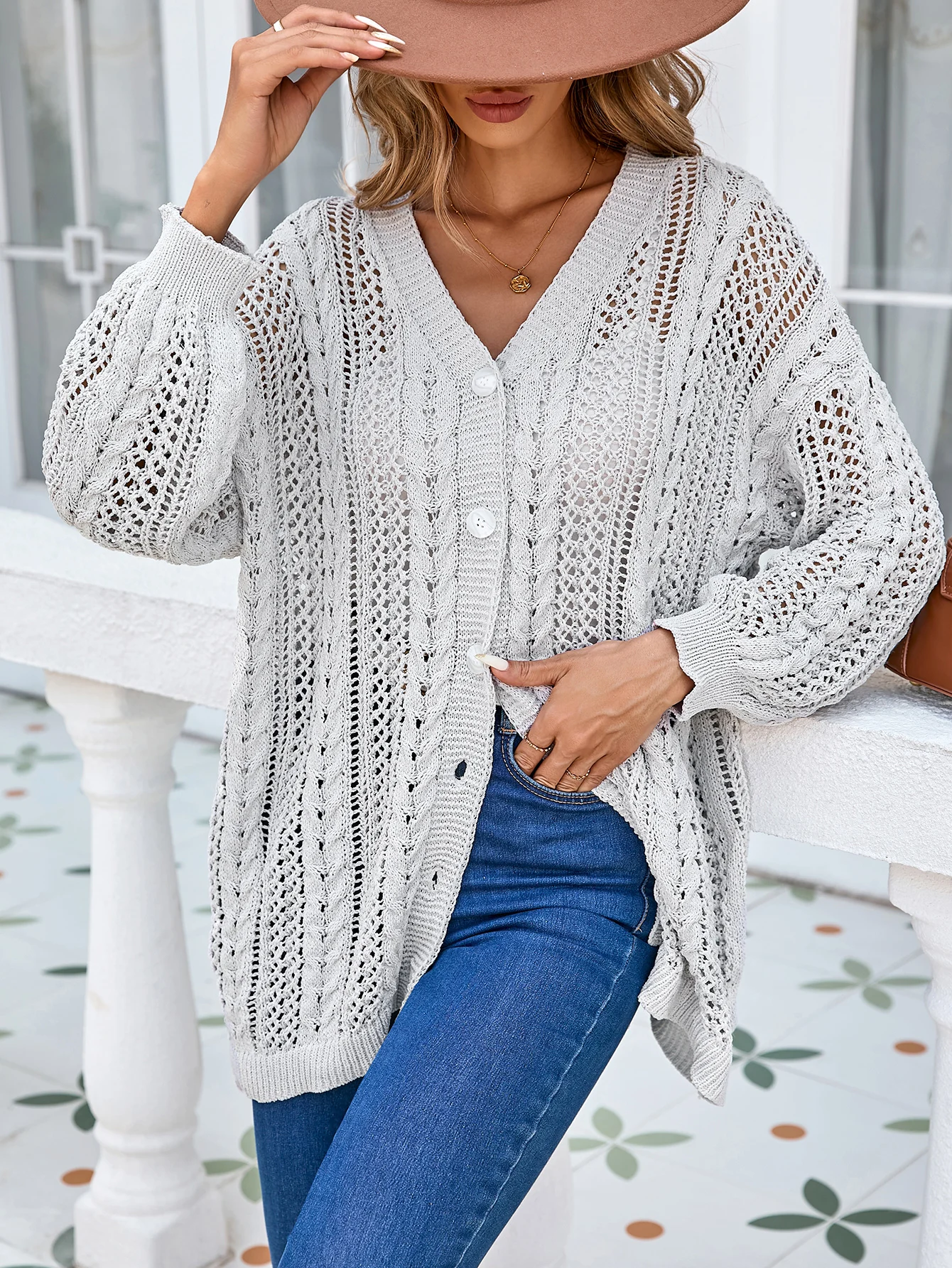 Autunno e inverno nuove maglieria da donna in Europa e negli Stati Uniti cardigan con bottoni in canapa nel lungo cappotto maglione
