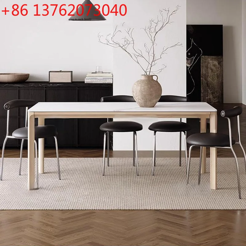 

Скандинавский обеденный стол из массива дерева для небольшой квартиры, прямоугольный, с каменной столешницей.