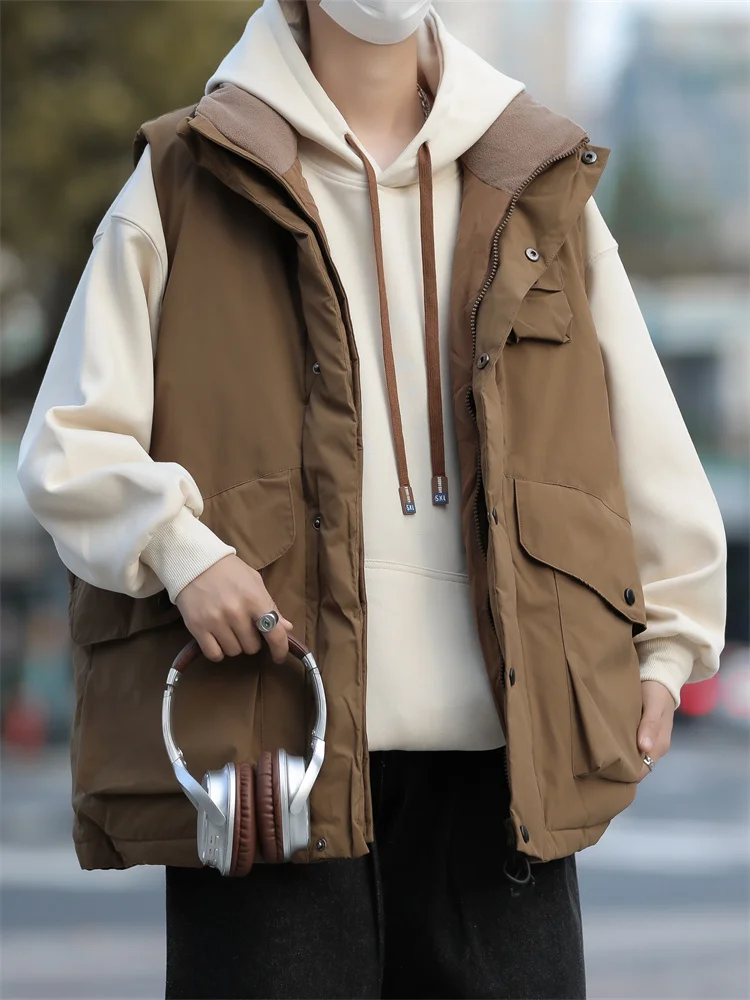 

2024 Men Autumn Fashion Pockets Cargo Vest Coats Male Vintage Solid Cotton-padded Vests Mens Stand Collar Warm Waistcoats G309