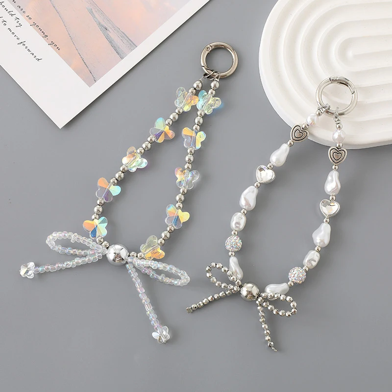 

Cute Butterfly Pearl Beaded Mobile Phone Chain Bow Knot Pendant Anti-Lost Phone Lanyard Wrist Band Keychain