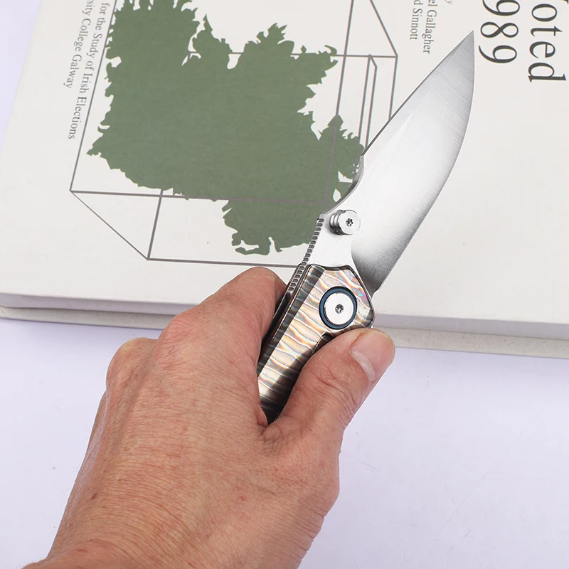 

VG10 steel plate tri color titanium alloy handle, fruit survival pocket, fishing camping collection, folding EDC knife