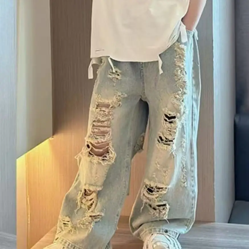 

Boys' Summer Set Fashionable 2026 New Children's Casual Irregular Hole Jeans+Tank Top T-shirt Two-piece Set