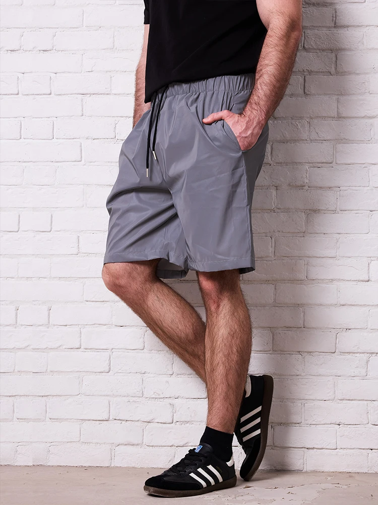 夏の新メンズ反射ショーツ屋外ナイトランニングジョガールーズカジュアル膝丈ショーツロックヒップホップダンスストリート