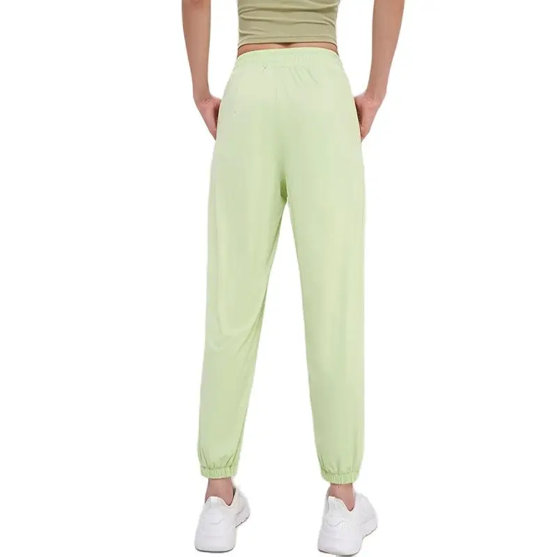 SOISOU Pantaloni da donna in Nylon pantaloni sportivi da palestra pantaloni sportivi larghi da Yoga abbigliamento sportivo traspirante elastico vita